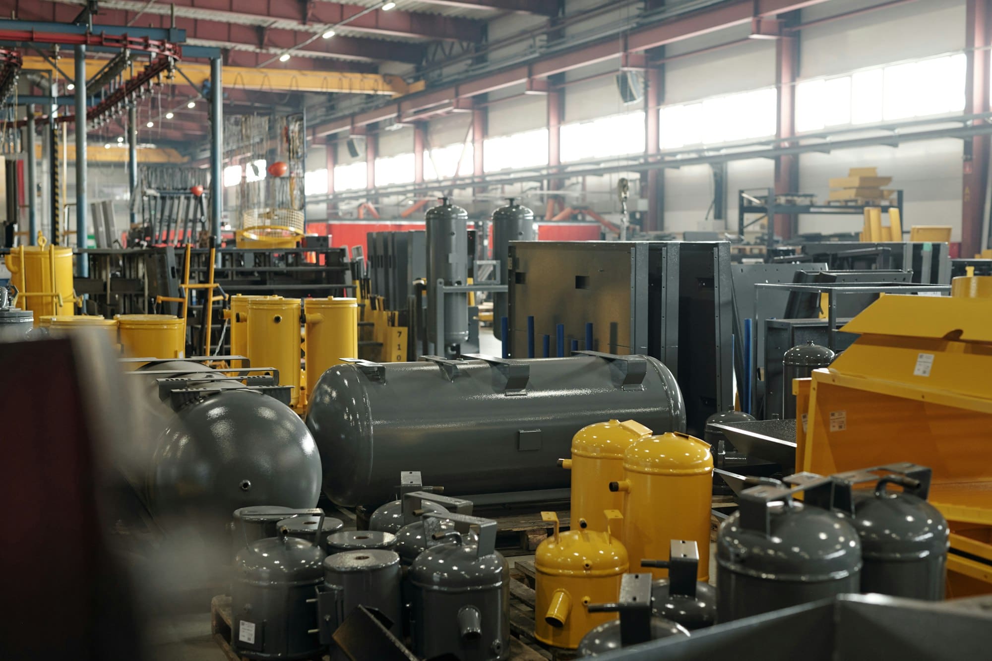 Interior of workshop or warehouse of contemporary factory or industrial plant with new equipment